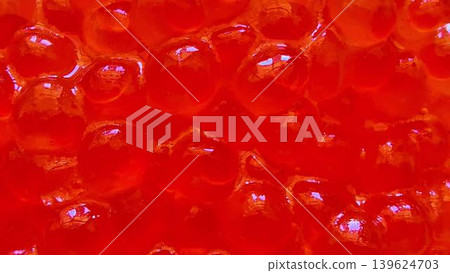 A Vibrant Serving of Salmon Roe Displayed Beautifully on a Plate for Culinary Delight 139624703