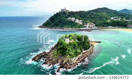 Stunning Aerial View of a Beautiful Coastal Landscape Featuring an Island and a Majestic Castle 139624772