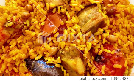 Enjoy Delicious Nigerian Jollof Rice with a mix of flavorful Vegetables and Meat Enjoy Delicious Nigerian Jollof Rice with a mix of flavorful Vegetables and Meat 139624823