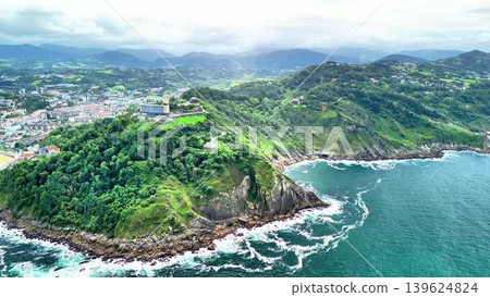 Captivating Aerial View of a Lush and Vibrant Coastal Landscape Featuring a City and Ocean 139624824