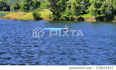 Enjoy a Relaxing and Peaceful Summer Day Spent on the Lake with a Beautiful Floating Dock Enjoy a Relaxing and Peaceful Summer Day Spent on the Lake with a Beautiful Floating Dock 139624835