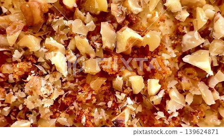 A CloseUp Photo of Chopped Walnuts Perfect for Various Culinary Uses and Delicacies 139624871