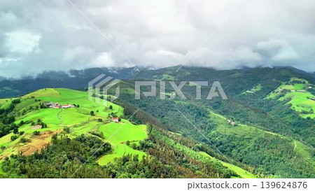Stunning and breathtaking aerial view showcasing the lush green mountains and rolling hills Stunning and breathtaking aerial view showcasing the lush green mountains and rolling hills 139624876