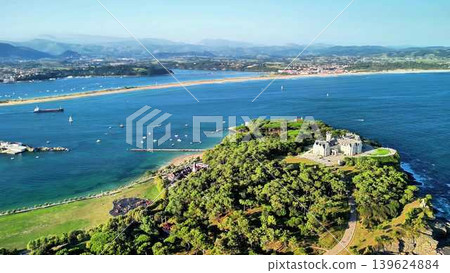 A Stunning Aerial View Showcasing a Vibrant Coastal Landscape Featuring Islands and Boats A Stunning Aerial View Showcasing a Vibrant Coastal Landscape Featuring Islands and Boats 139624884