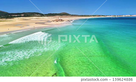 Breathtaking Aerial View of a Pristine Beach Featuring Crystal Clear and Turquoise Waters 139624886