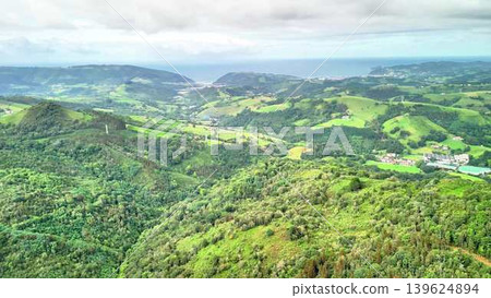 Experience a Stunning Aerial View Showcasing Lush Green Landscapes and Coastal Beauty Experience a Stunning Aerial View Showcasing Lush Green Landscapes and Coastal Beauty 139624894