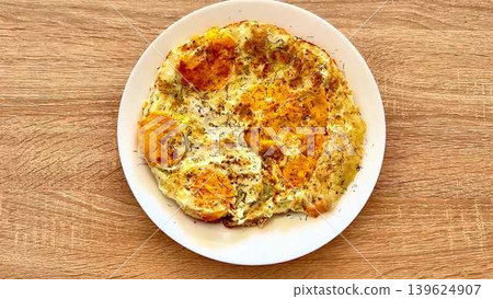 A Delicious and Fluffy Egg Omelette Served Beautifully on a Plate Ready to Enjoy A Delicious and Fluffy Egg Omelette Served Beautifully on a Plate Ready to Enjoy 139624907