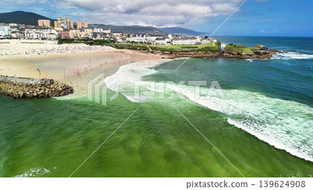 Breathtakingly Stunning Aerial View of a Beautiful Beach and Rolling Ocean Waves Breathtakingly Stunning Aerial View of a Beautiful Beach and Rolling Ocean Waves 139624908