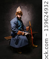 Cossack warrior wearing historical costume with sabre 139624932