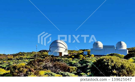 The Breathtaking and Stunning View of Astronomical Observatories Beneath a Clear Blue Sky The Breathtaking and Stunning View of Astronomical Observatories Beneath a Clear Blue Sky 139625047