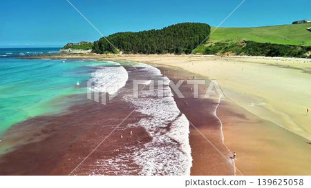 Stunning Aerial View of a Beautiful Scenic Beach with Turquoise Waters and Soft Sandy Shore 139625058
