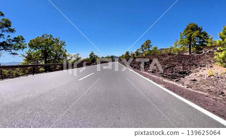 Enjoy a Scenic Journey Along the Mountain Road, Embracing the Beauty of Nature Around You Enjoy a Scenic Journey Along the Mountain Road, Embracing the Beauty of Nature Around You 139625064