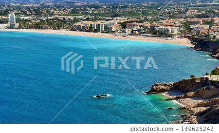 A stunning and breathtaking coastal view showcasing a serene beach destination awaits you A stunning and breathtaking coastal view showcasing a serene beach destination awaits you 139625242