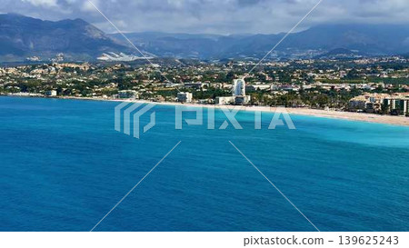 Experience the Stunning Aerial View of a Coastal Paradise with Crystal Clear Waters Experience the Stunning Aerial View of a Coastal Paradise with Crystal Clear Waters 139625243