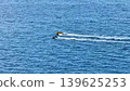 Jet Skis Racing on the Vibrant and Beautiful Ocean Waters, Full of Life and Excitement 139625253