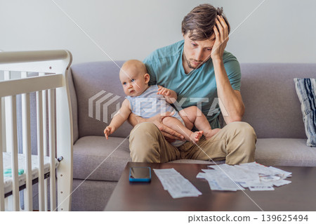 Father sitting on sofa holding baby while calculating monthly expenses with receipts at home. Stressed dad managing budget and childcare. Financial stress, parenthood and real life concept Father sitting on sofa holding baby while calculating monthly expenses with receipts at home. Stressed dad managing budget and childcare. Financial stress, parenthood and real life concept 139625494