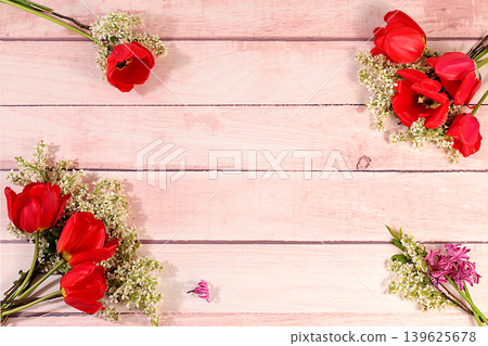 Abstract floral composition and banner for the screen.Still life with spring tulips, muscari, hyacinths, forgetmenots and bird cherry against an elegant background. A floral holiday card Abstract floral composition and banner for the screen.Still life with spring tulips, muscari, hyacinths, forgetmenots and bird cherry against an elegant background. A floral holiday card 139625678