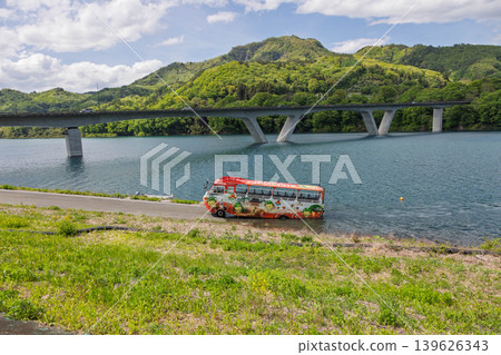 View of Lake Yamba Agatsuma and a water bus from Lake Station Maruiwa. View of Lake Yamba Agatsuma and a water bus from Lake Station Maruiwa. 139626343