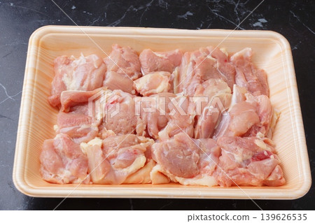 Diced domestic young chicken thigh Diced domestic young chicken thigh 139626535