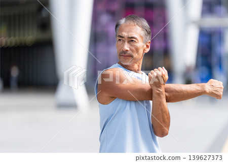 Senior men stretching 139627373