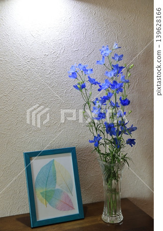 Delphinium and forehead Delphinium and forehead 139628166