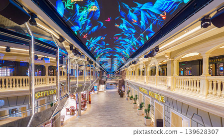 Dubai, United Arab Emirates - Jan 19 2024, panoramic view of the interior gallery with shops on the MSC Virtuosa cruise ship with luminous screens on the ceiling, Dubai, UAE Dubai, United Arab Emirates - Jan 19 2024, panoramic view of the interior gallery with shops on the MSC Virtuosa cruise ship with luminous screens on the ceiling, Dubai, UAE 139628307