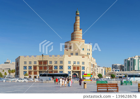 Doha, Qatar - Jan 14 2024, Panoramic view of the Sheikh bin Zaid Qatar islamic cultural center, Fanar, in the foreground a square with a people walking on it, at daytime, Doha, Qatar Doha, Qatar - Jan 14 2024, Panoramic view of the Sheikh bin Zaid Qatar islamic cultural center, Fanar, in the foreground a square with a people walking on it, at daytime, Doha, Qatar 139628676