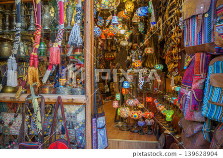 Doha, Qatar - Jan 14 2024, View of the interior of an Arab souvenir shop with lots of colorful glass lamps, lanterns and other things, at Souq Waqif Bazaar, Doha, Qatar Doha, Qatar - Jan 14 2024, View of the interior of an Arab souvenir shop with lots of colorful glass lamps, lanterns and other things, at Souq Waqif Bazaar, Doha, Qatar 139628904