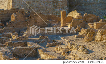 Manama, Bahrain - Jan 15 2024, Panoramic view of the ruins of the ancient fortress of Qalat Al Bahrain, included in the UNESCO World Heritage List, at daytime, Manama, Bahrain Manama, Bahrain - Jan 15 2024, Panoramic view of the ruins of the ancient fortress of Qalat Al Bahrain, included in the UNESCO World Heritage List, at daytime, Manama, Bahrain 139628936