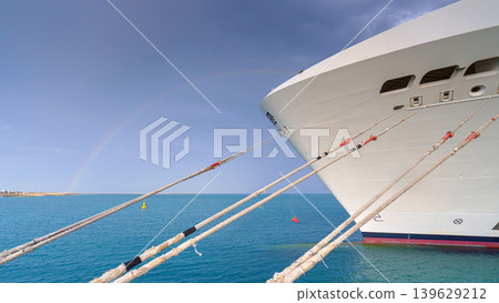 Sir Bani Yas Island, United Arab Emirates - Jan 18 2024, Panoramic view from below on the bow of the MSC Virtuosa cruise ship moored at the pier of Sir Bani Yas Island, United Arab Emirates Sir Bani Yas Island, United Arab Emirates - Jan 18 2024, Panoramic view from below on the bow of the MSC Virtuosa cruise ship moored at the pier of Sir Bani Yas Island, United Arab Emirates 139629212