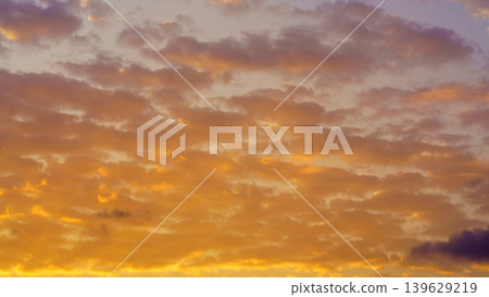 A panoramic view of colourful beatiful evening sky with pink, purple, peach and orange clouds A panoramic view of colourful beatiful evening sky with pink, purple, peach and orange clouds 139629219