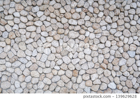 A wall inlaid with pebbles A wall inlaid with pebbles 139629628