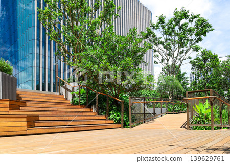 A building terrace with a wooden deck A building terrace with a wooden deck 139629761