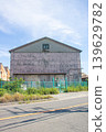 Old warehouses standing in the harbor and the blue sky 139629782