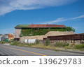 Old warehouses standing in the harbor and the blue sky 139629783