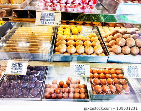 Assorted Indian Sweets Displayed in Shop Counter Assorted Indian Sweets Displayed in Shop Counter 139631231