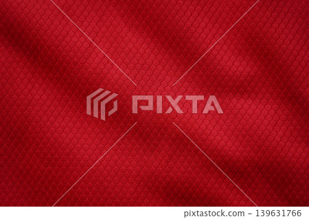Close up of red football jersey sports clothing fabric texture. Close up of red football jersey sports clothing fabric texture. 139631766