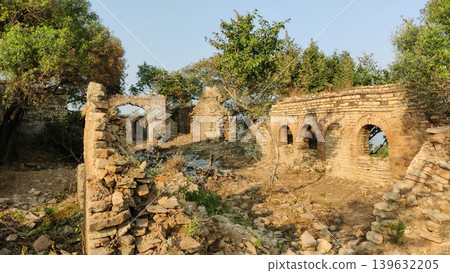 Broken Sikh temple wall at ancient Tilla Jogian ruins in Pakistan 139632205