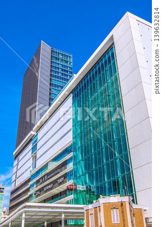 Yokohama cityscape, Japan, May 13th. View of JR Yokohama Station (West Exit) and the JR Yokohama Tower. Yokohama cityscape, Japan, May 13th. View of JR Yokohama Station (West Exit) and the JR Yokohama Tower. 139632814