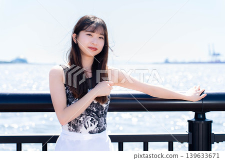 Japanese ballerina dancing against the backdrop of the sea Japanese ballerina dancing against the backdrop of the sea 139633671