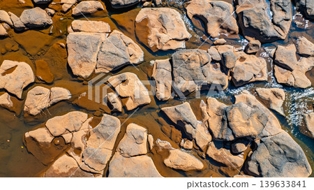 Aerial Top Down View of Rocky River Stream with Clear Flowing Water Aerial Top Down View of Rocky River Stream with Clear Flowing Water 139633841