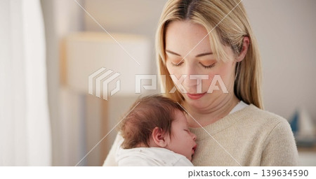 Newborn, love and mother with baby for sleeping, bonding and child development together at home. Family relationship, motherhood and mom carry infant for care, support and dreaming in nursery room Newborn, love and mother with baby for sleeping, bonding and child development together at home. Family relationship, motherhood and mom carry infant for care, support and dreaming in nursery room 139634590