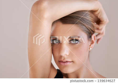 Portrait, beauty and skincare of woman in makeup at spa facial treatment for aesthetic. Face, confident model in cosmetics and glow for wellness, serious and isolated on a brown studio background Portrait, beauty and skincare of woman in makeup at spa facial treatment for aesthetic. Face, confident model in cosmetics and glow for wellness, serious and isolated on a brown studio background 139634627
