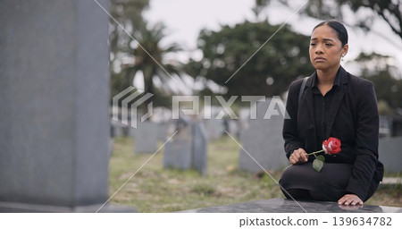 Sad woman, graveyard and rose on tombstone in mourning, loss or grief at funeral or cemetery. Female person with flower in depression, death or goodbye at memorial or burial service for loved one 139634782