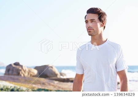 Fitness, thinking and space with man at beach in summer for sports, training or cardio on blue sky. Exercise, vision and health with young runner or athlete by ocean or sea for physical workout Fitness, thinking and space with man at beach in summer for sports, training or cardio on blue sky. Exercise, vision and health with young runner or athlete by ocean or sea for physical workout 139634829
