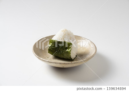 Rice ball on a plate Rice ball on a plate 139634894