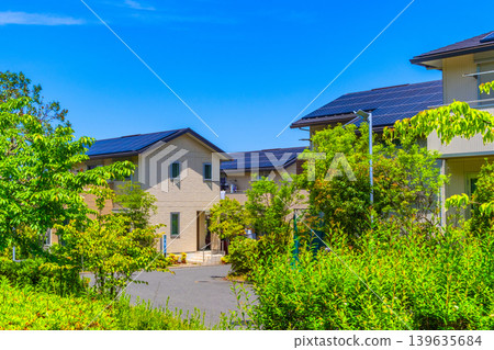 A quiet eco-town with underground power lines and solar power generation. 139635684