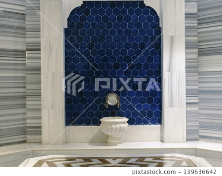 blue tiles and copper fountain in a Turkish bath blue tiles and copper fountain in a Turkish bath 139636642