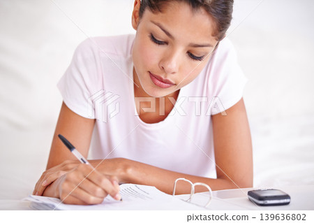 Woman, writer and planning in journal, writing ideas and inspiration or research in bed at home. Female person, author and notes in book for project, brainstorming and contemplation in bedroom Woman, writer and planning in journal, writing ideas and inspiration or research in bed at home. Female person, author and notes in book for project, brainstorming and contemplation in bedroom 139636802
