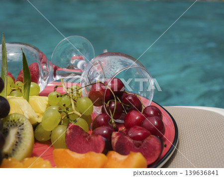 fresh fruits by the pool 139636841